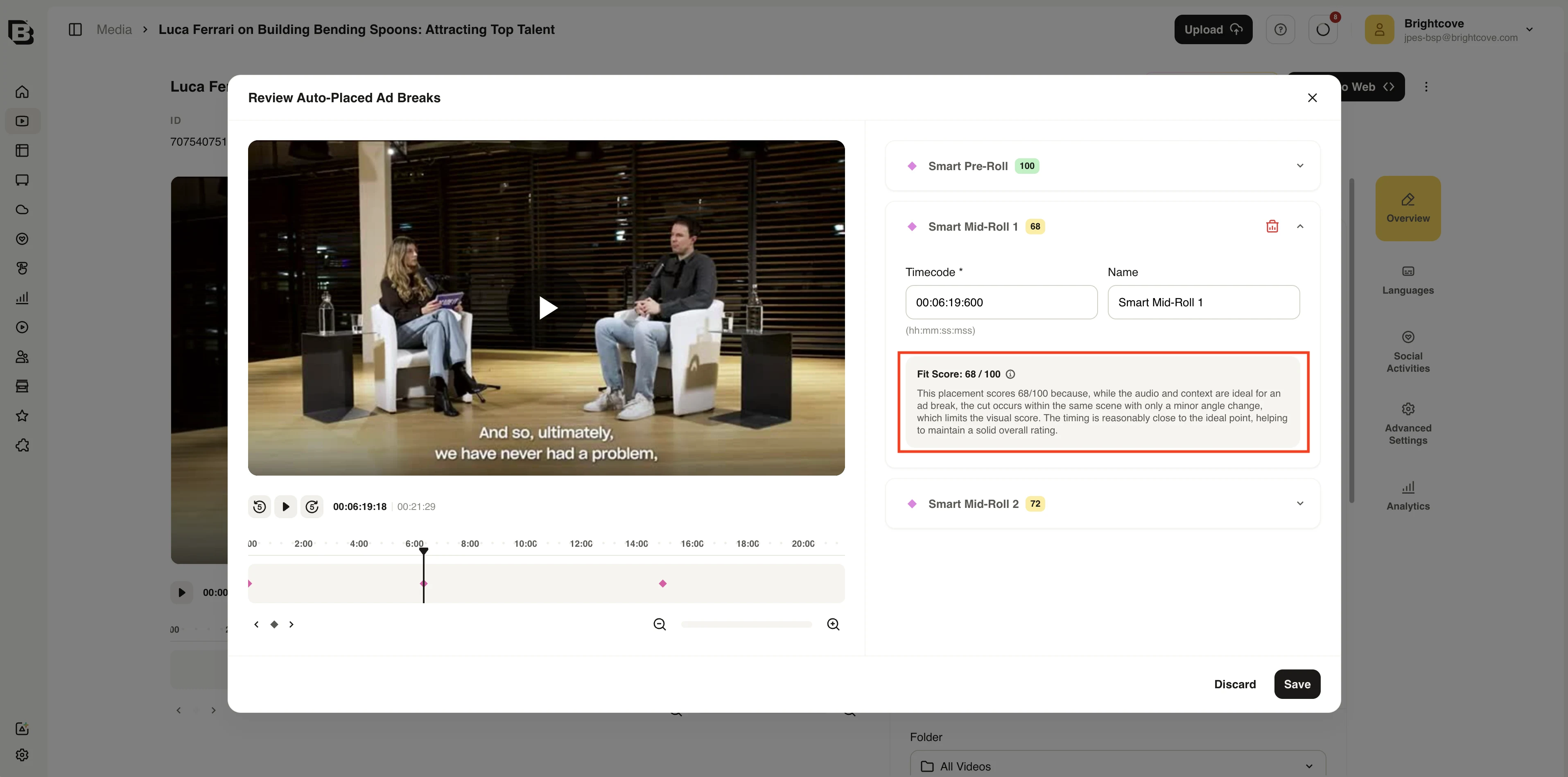 Review Auto-Placed Ad Breaks dialog with Fit score, score explanation, timeline, and break list